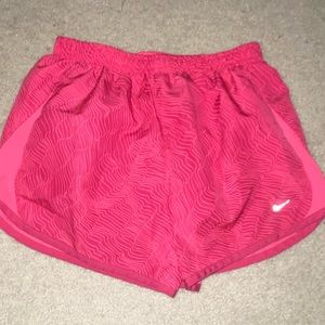 Pink Nike athletic shorts